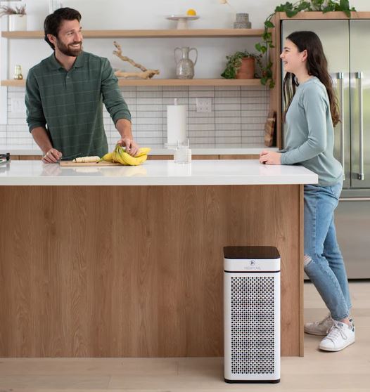 The MA-40 air purifier in a spacious kitchen combating cooking fumes and VOCs.