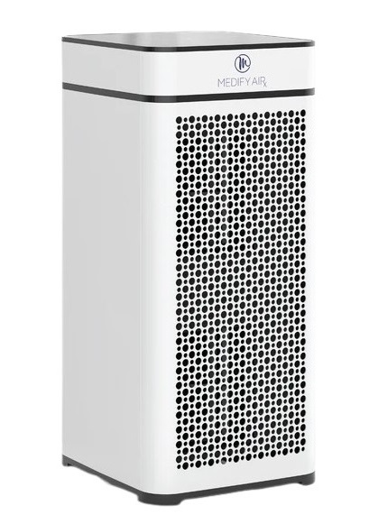 Side view of sleek white Medify MA-40 air purifier complementing modern home decor.